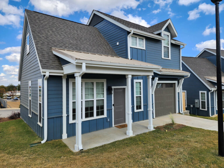 Blue house with new gutters