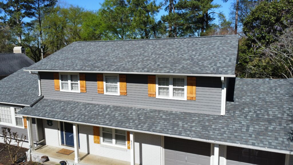 Front view of new roof on two-story house