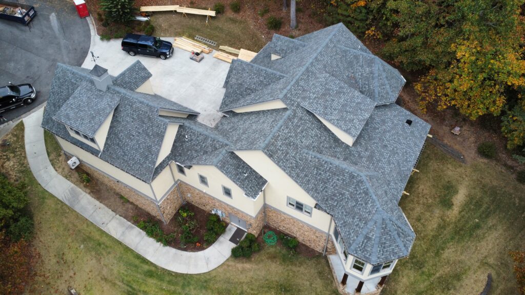 Large house from above with a new rooftop